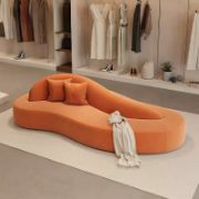 A simple modern sofa with a curved design