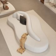 A simple modern sofa with a curved design