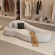 A simple modern sofa with a curved design