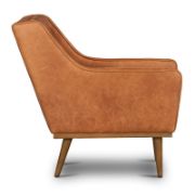 A leather recliner chair with tufted buttons.
