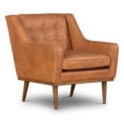 A leather recliner chair with tufted buttons.