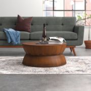 Modern hourglass-style round coffee table