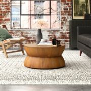 Modern hourglass-style round coffee table