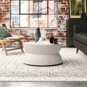 Modern hourglass-style round coffee table