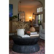Modern hourglass-style round coffee table