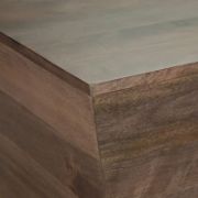 Square-shaped coffee table with a modern design and elegant copper detailing