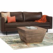 Square-shaped coffee table with a modern design and elegant copper detailing
