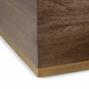 Square-shaped coffee table with a modern design and elegant copper detailing
