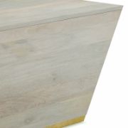 Square-shaped coffee table with a modern design and elegant copper detailing