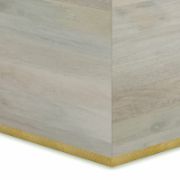 Square-shaped coffee table with a modern design and elegant copper detailing