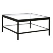 Glass Surface Coffee Table Features a Simple and Elegant Design
