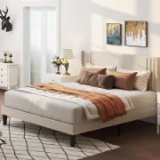 صورة سرير مع لوح ظهر مبطن بتصميم عصري